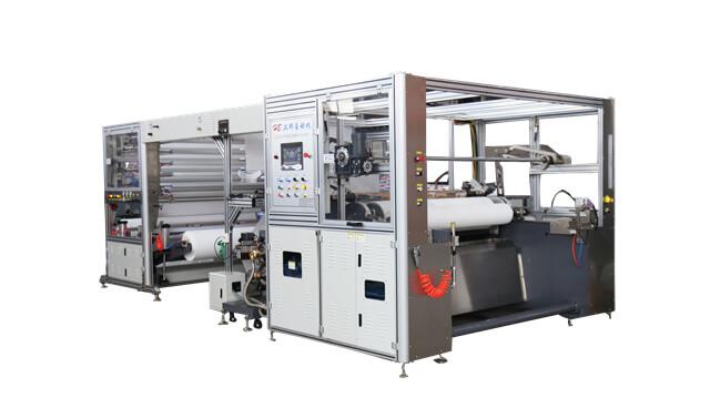 Non woven embossing & perforating slitting machine (Double unwinder and double rewinder)
