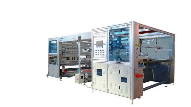 Multifunctional nonwoven embossing perforating slitting and rewinding machine for nappy
